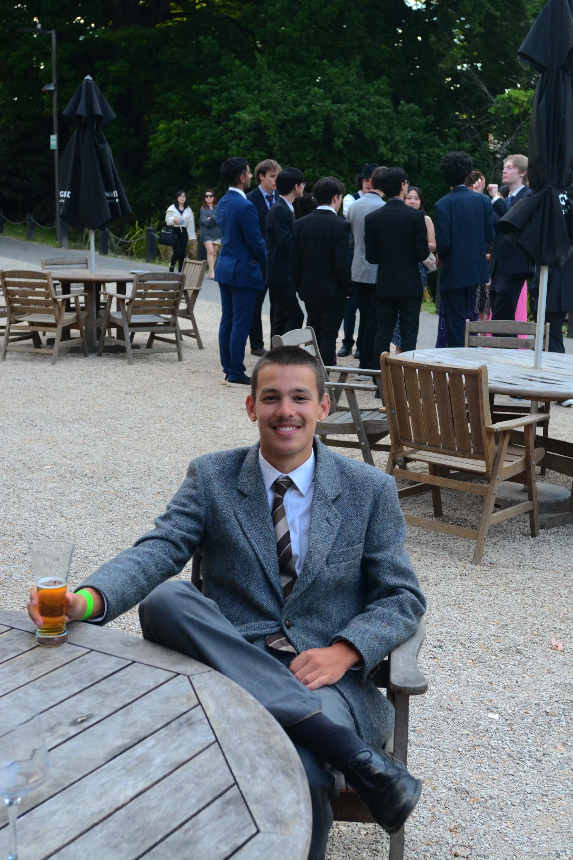 Will turner sitting, wearing a suit